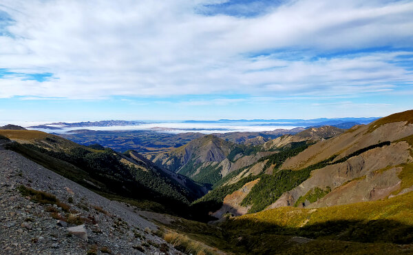 Deep Valley with Fog in distance